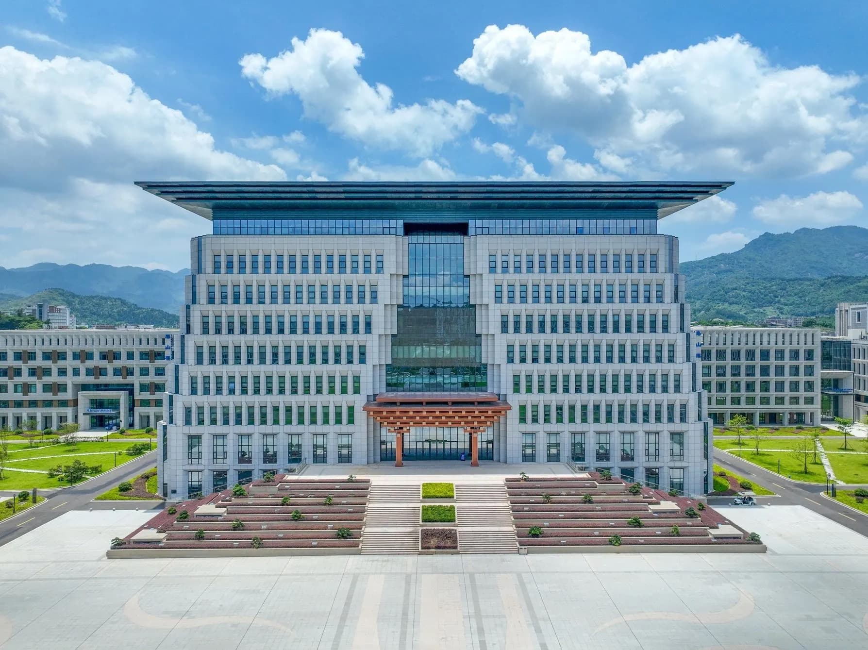 The Fuyao University of Science and Technology campus set against green mountains in Fuzhou, China