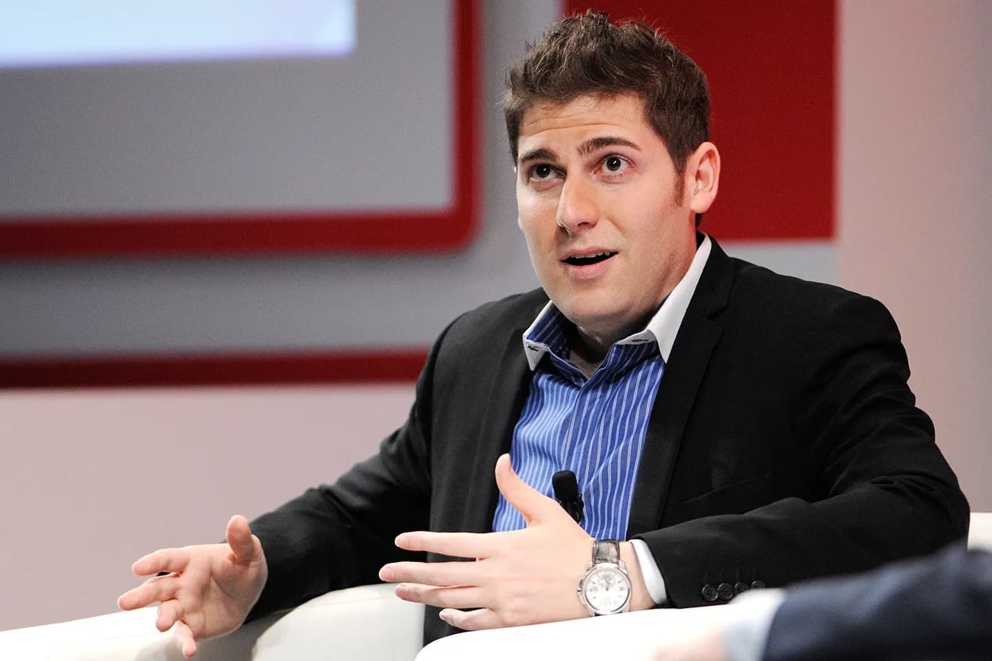 Facebook cofounder Eduardo Saverin speaking at a conference