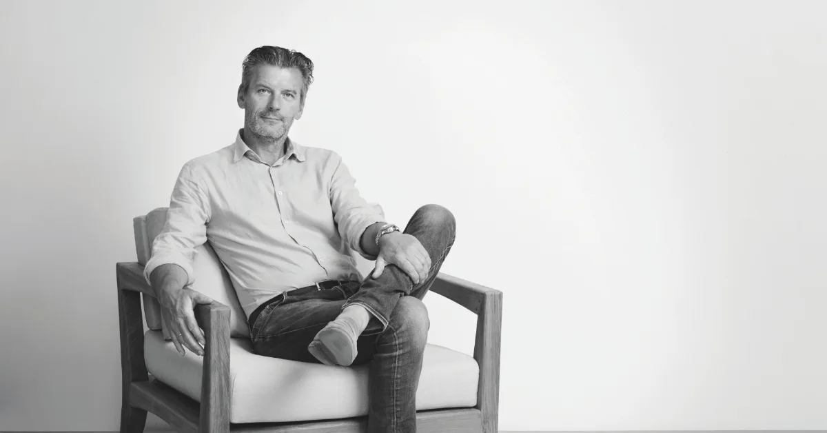 Kris Van Puyvelde, founder of Royal Botania, seated in a lounge chair