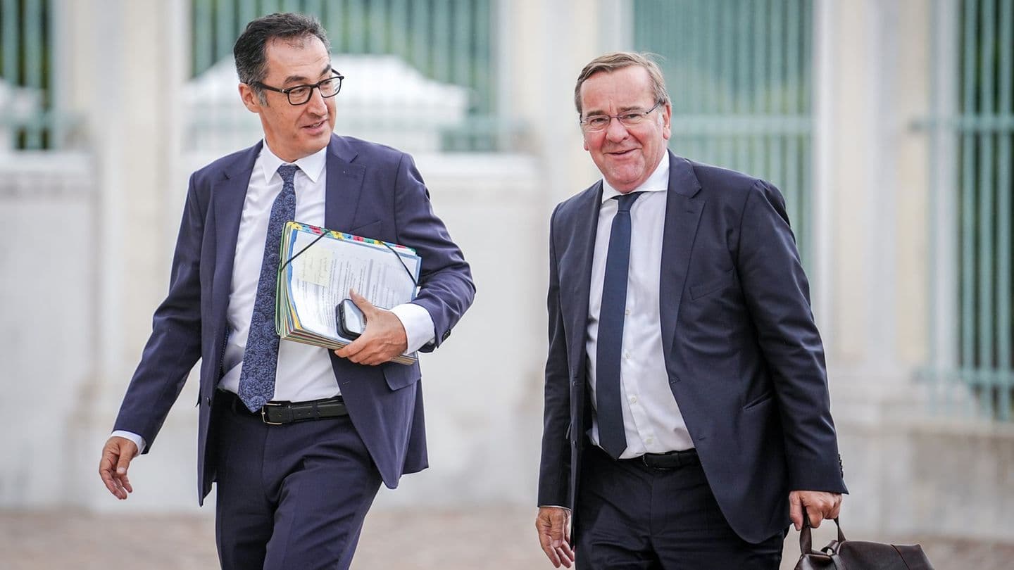 German Green politician Cem Ozdemir, left, and Defense Minister Boris Pistorius